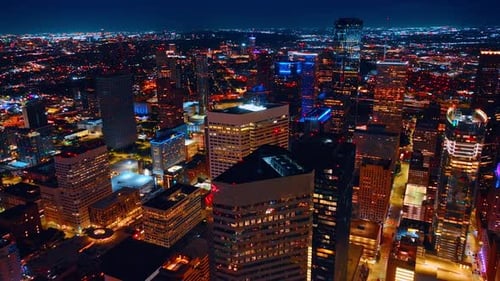 Rising over luminous city scenery of Houston, Texas, USA.