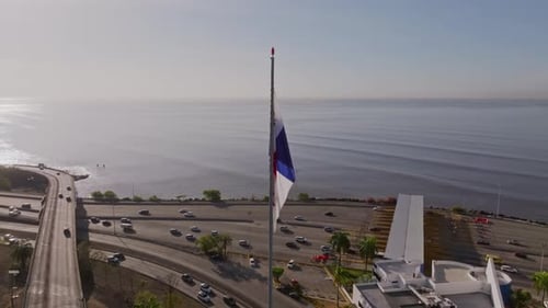 Aerial Shot of the Panamanian Flag Over Panama City Highway