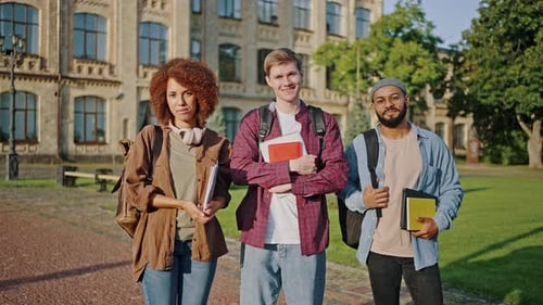 Smiling Students Standing on a College Campus