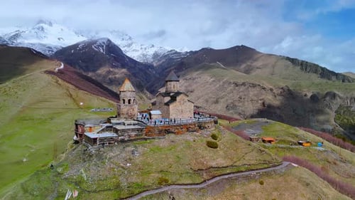 Aerial view of Gergeti Trinity Church and mountains, Georgia.