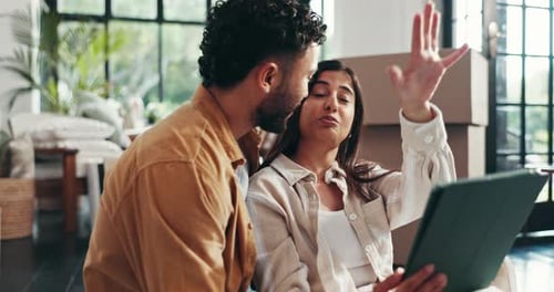 Couple with Tablet Plan Home Decor After Moving