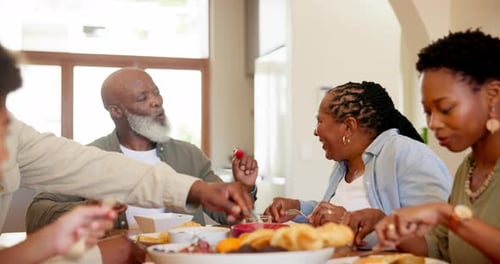 Family and Friends Eating Together