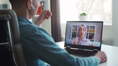Boyfriend and His Muslim Girlfriend Have Online Call Conversation Via Internet Young People are