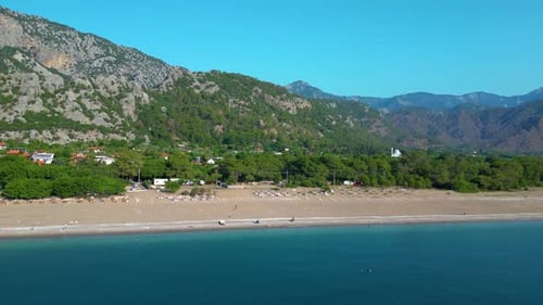 Aerial Drone View of a Serene Beach and Turquoise Sea