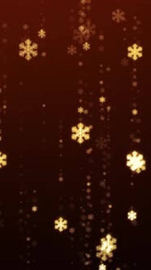 Golden glitter glowing snowflakes falling in soft shimmering motion