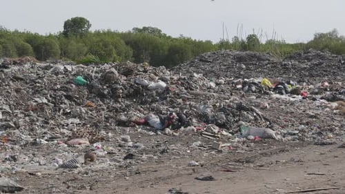 Rubbish tip, landfill, waste area in Lembongan Bali ground different angle