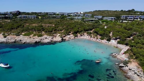 People swimming in the sea and sunbathing on the beach on the Turkish coast