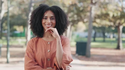 Portrait, pride and woman is confident in park for relaxing with freedom or motivation for travel