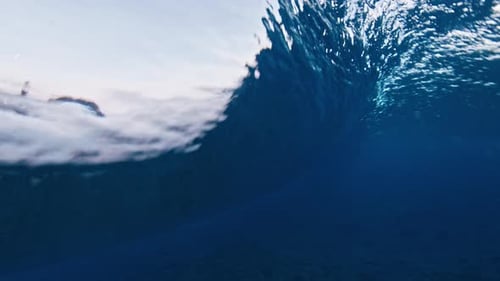 Underwater View of the Ocean Wave Breaking Over the Shore in the Maldives