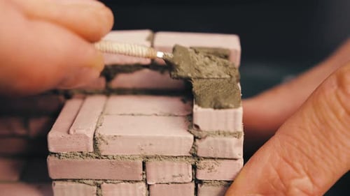 Miniature Brick House Construction with Trowel Tiny Brickwork and Cement Wall