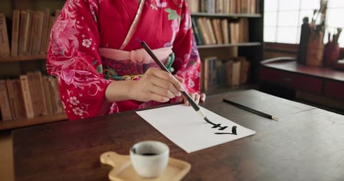 Paintbrush, ink and hands, Asian font or script with paper, document and creativity