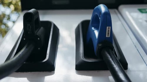 A Modern Electric Vehicle Charging Station Strategically Located in an Urban Setting for Convenience