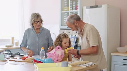 Family Preparing Meal in Bright Kitchen