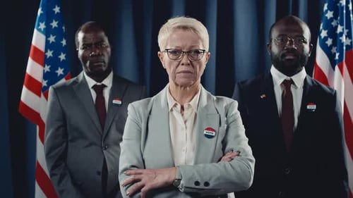 Woman With Men In Suits, American Flags