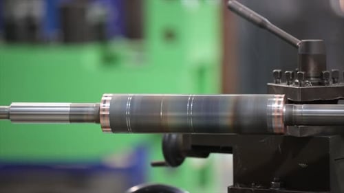 Metal Machine Lathe Cuts Metal in Industrial Workplace