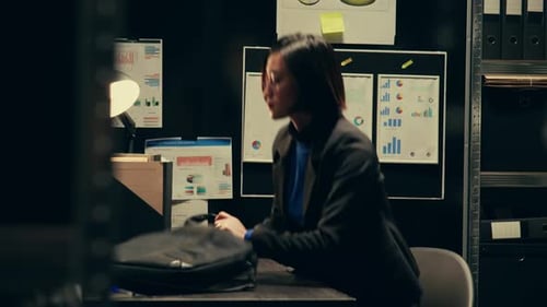 Businesswoman Working on Laptop in Office