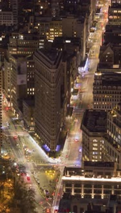 Cityscape of Manhattan with Flatiron Building at Night New York City United States Aerial View