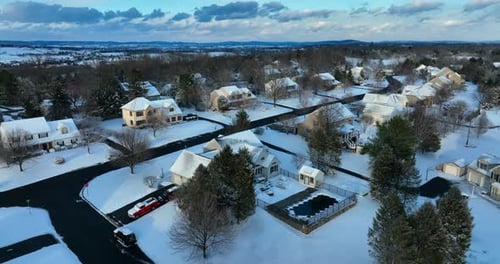 Winter Snowfall Covering Quiet Suburban Neighborhood