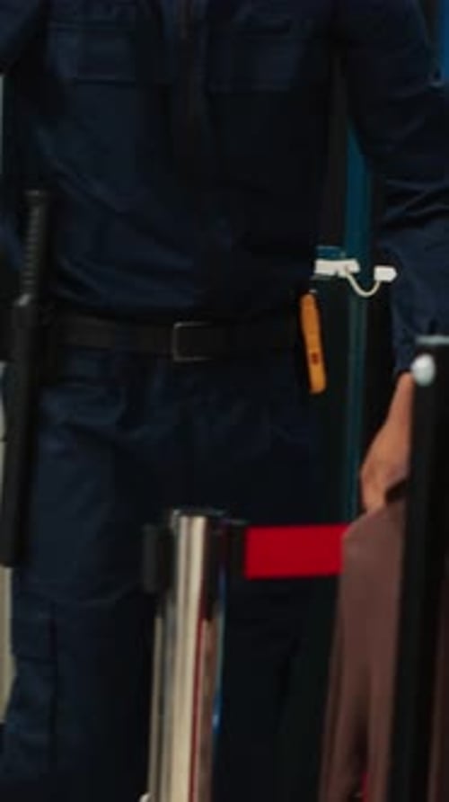 Security Guard Opens Doors for Eager Customers