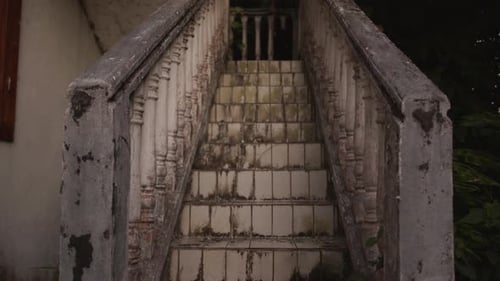 Decaying staircase of abandoned building