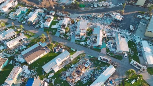 Severely Damaged Houses After Hurricane Ian in Florida Mobile Home Residential Area Consequences of