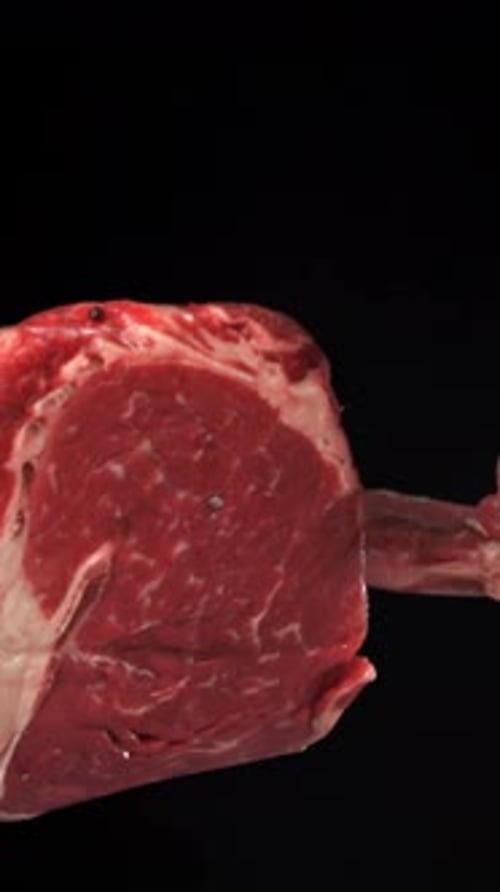 Beef Ribeye Steak Fly Up and Falls Down Filmed on a Highspeed Camera at 1000 Fps