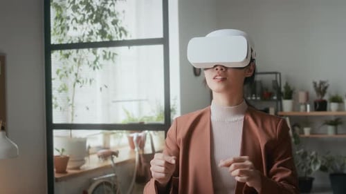 Young Businesswoman Experiencing Virtual Reality in Office