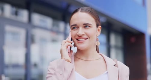 Smiling Woman Talking on Phone in City