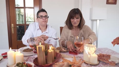 Lesbian Couple and Family Enjoying the Christmas Lunch