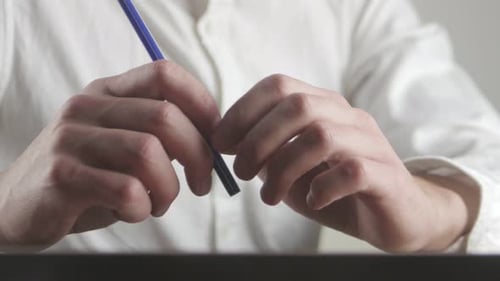 Close Up Hands of Tired Businessman Waiting for Something and Makes Nervous Movements with the Pen