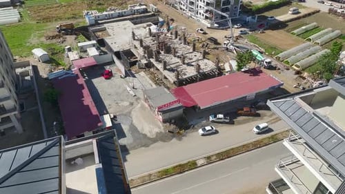 Aerial View Building Site Activity Workers Bend Rebar and Pour Concrete