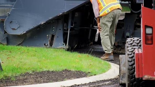 Shredder Transports Old Asphalt Destroyed Road Surface to Be Replaced with a New Surface a Shredder