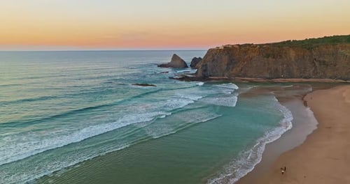 Aerial View of Ocean Waves Sandy Shoreline Waves Caress Ocean Edge Beauty Oceanic Coast Portugal