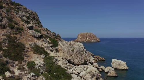 Aerial view of blue sea and rocks.4K.