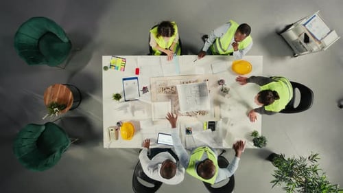 Top Down View of Architects Working on Real Estate Investment Plan