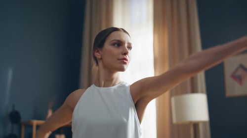 Woman Doing Yoga and Stretching at Home
