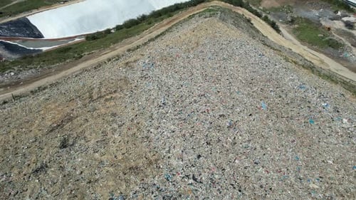 Aerial View of Urban Landfill Site During Daytime