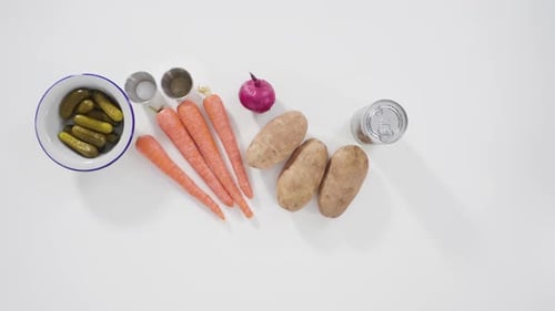 Flat Lay Step By Step Ingredients to Prepare Vinaigrette Salad on the Ocunter