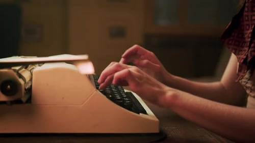 Girl Hands Typing Text on a Typewriter in the Office or at Home A Writer or Journalist at Work in