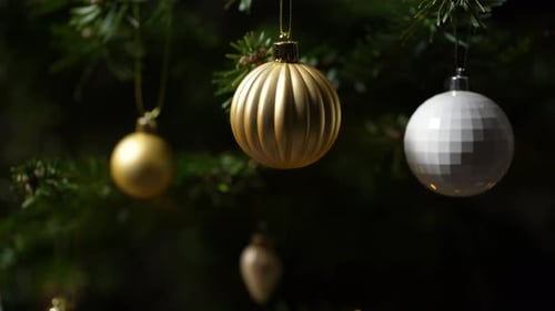Christmas Tree With Gold and White Ornaments