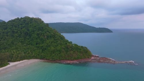 Aerial view of palm-fringed Ao Jark Beach in sunset light, Koh Kood, Thailand