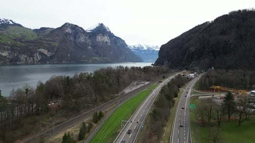 Highway motorway near Lake Walensee and Swiss Alps mountains Switzerland