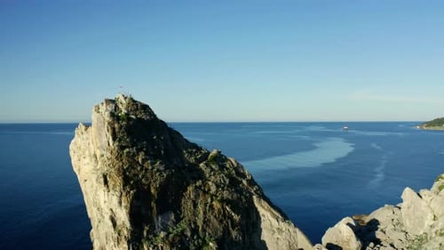 A Majestic Rock Formation Rising From the Depths of the Ocean