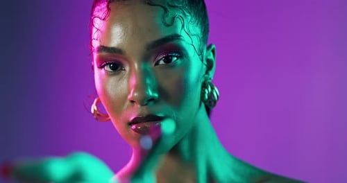 Neon lights, makeup and face of woman in studio with beauty, creativity and vibrant color
