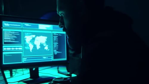 Wanted Hackers Coding Virus Ransomware Using Laptops and Computers in the Basement Cyber Attack