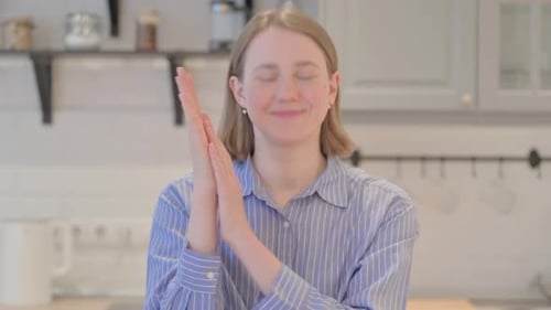Smiling Woman Clapping in Home Environment