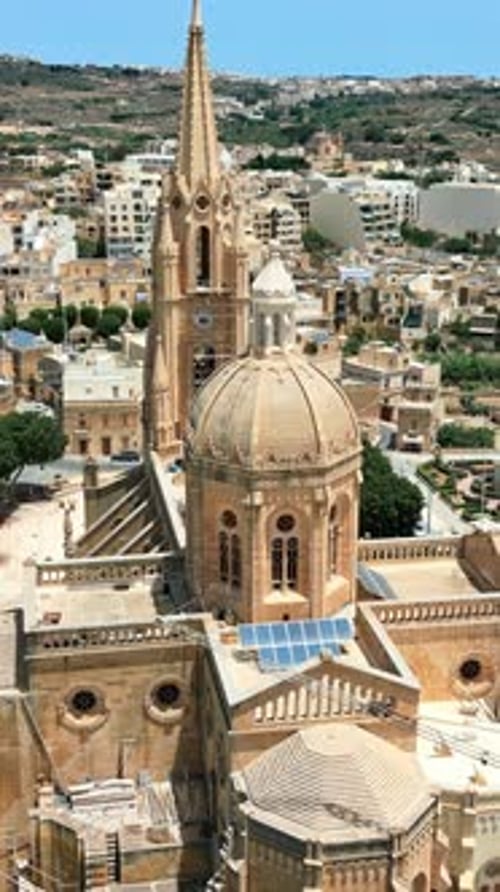 Aerial drone view of the Gozo island in Malta, in the Mediterranean Sea. Vertical vertical