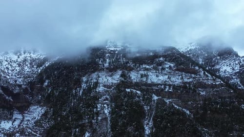 Snowy mountains covered in mist, scenic winter wilderness near Canfranc, Spain