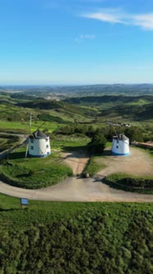 Windmills in Montejunto Mountains Portugal Aerial View Vertical Video