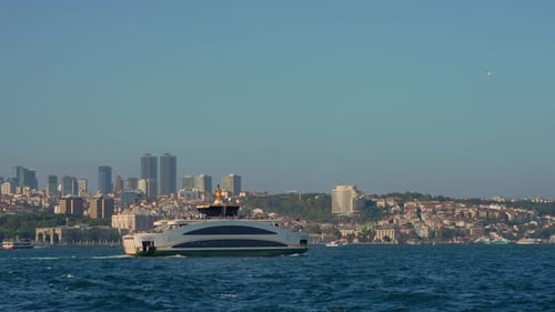 A Grand Ferry Boat Embarks on Its Journey Across the Bosphorus Strait Bridging the European and